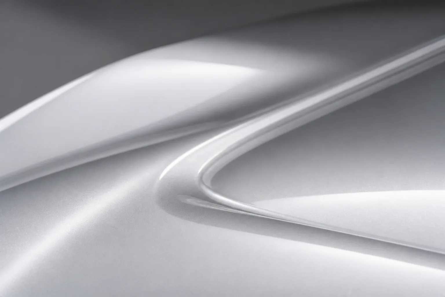 Abstract silver reflection across the Apex Roadster bodywork